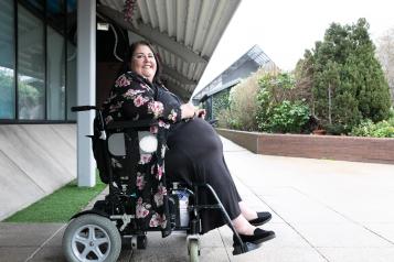 Woman in a wheelchair outside